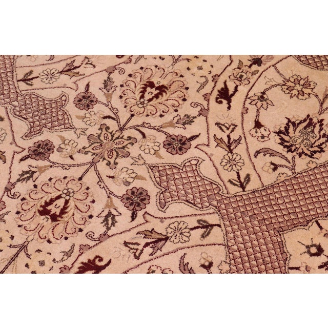 Designed with mesmerizing intricacy and gorgeous color palette, this hand-knotted masterpiece demonstrates the beauty and...
