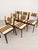 A beautiful set of six Danish dining chairs designed by Johannes Andersen, dating from the 1960s. Crafted from rosewood,...