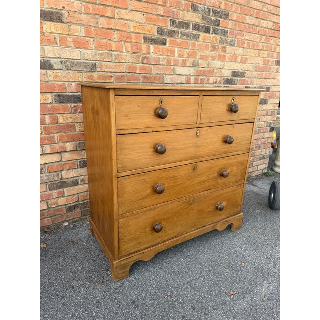 This is a lovely antique pine chest! This piece dates to the 19th century and has lovely patina. The wood has a warm glow,...
