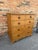 This is a lovely antique pine chest! This piece dates to the 19th century and has lovely patina. The wood has a warm glow,...
