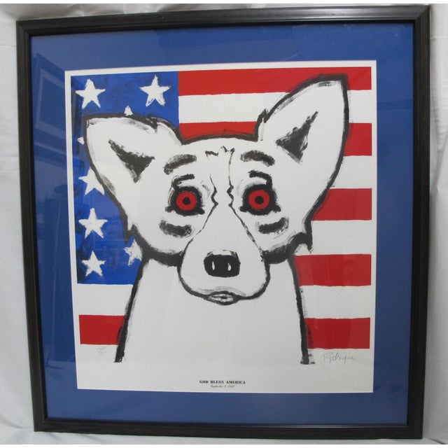 Famous print titled "God Bless America" by the American artist George Rodrigue. Created on September 12, 2001, it was the...