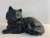 Vintage fireplace cat or door stop cast made of cast iron and painted black with green eyes. Cast from the original Hubley...