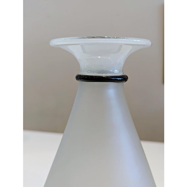 Sculptural frosted glass vessel with dramatic flared rim and thin black accent band. European modernist style, unmarked....