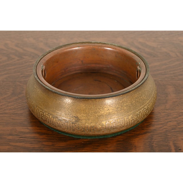 A rare and gorgeous Arts & Crafts or Art Deco period gilt bronze jardiniere or planter with decorative design and copper...