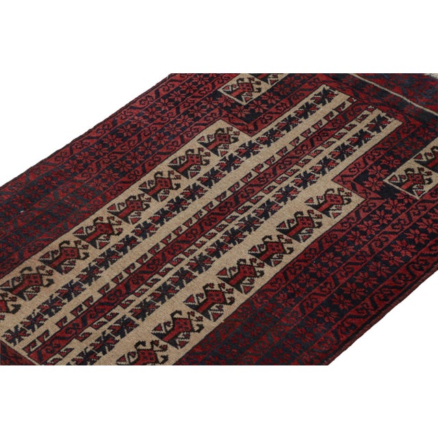 Hand knotted in wool, this 6x8 Baluch rug represents a new line of tribal carpets in the Modern Classics Collection by Rug...