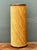This vintage cylinder pedestal showcases the timeless appeal of natural materials and refined mid-century craftsmanship....