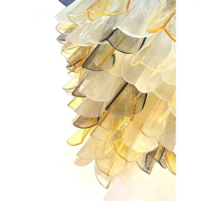 Contemporary “rondini” murano glass chandelier scenographic lively murano glass chandelier. “fiamme” elements in murano...