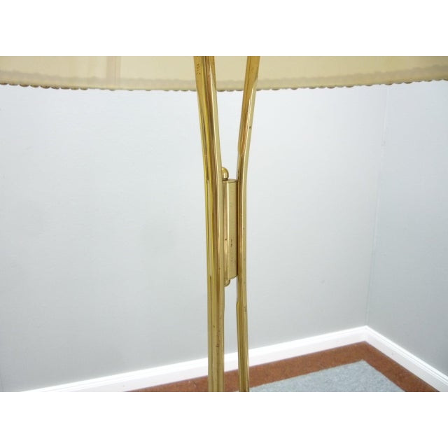 Imposing floor lamp from the fifties. Manufacturer German workshops. Material is made of brass and lamp base is metal....