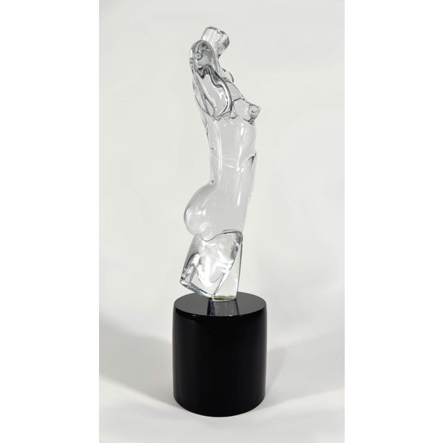 Vintage clear Murano art glass of a 3/4 nude female figure on a black base. Unsigned. Measurements: 6" x 5" x 19.5"H