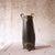 A 19th-century French Art Nouveau vase crafted in glass, characterized by its fluid lines and organic form. The design...