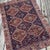 An Authentic Antique QashqaiTribal Rug Hand-knotted nearly 90 years ago by nomadic artisans, this antique rug reflects the...