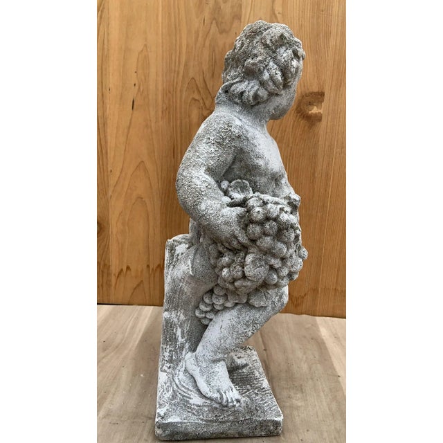 Vintage Neoclassical Style Cherub/Putti Garden Sculpture From a beautiful Southern Estate, approximately 50 years old.