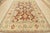 This traditional Oushak rug is hand-knotted with a wool pile with viscose highlights on a cotton foundation. This rug is...