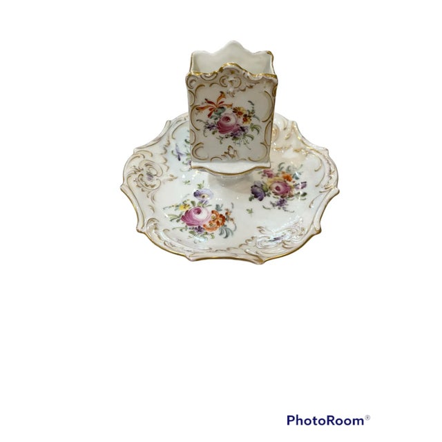 Lovely floral and gilt decorated porcelain match box holder/stand. Lego le makers mark on the bottom. Sourced in France.
