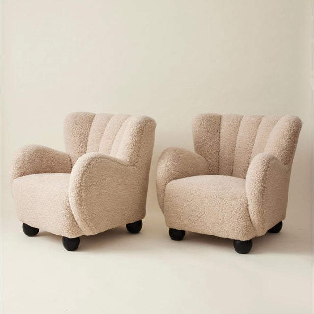 Danish cabinetmaker easy chairs, originally from the 1940's, meticulously newly upholstered in light colored lambswool....