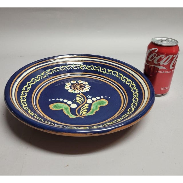 Vintage 1996 Westmoore Pottery redware charger by Seagrove, North Carolina potter David Farrell, hand decorated with...