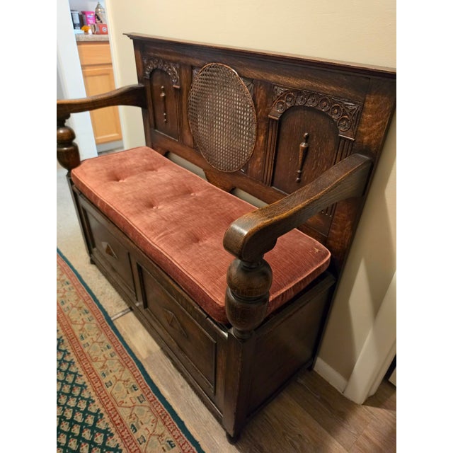 Late 19th Century Antique Oak Hall Bench Features Intricate Carvings and a Circular Cane Insert in the Backrest, Late 19th Century For Sale - Image 5 of 9