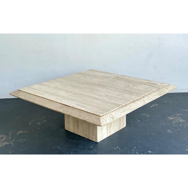 This sophisticated coffee table, masterfully crafted by Stone International in Italy, is a sublime representation of late...