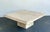 This sophisticated coffee table, masterfully crafted by Stone International in Italy, is a sublime representation of late...