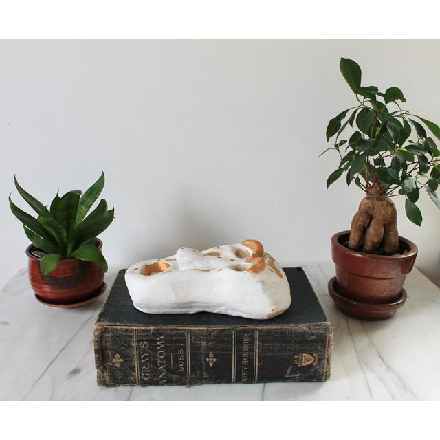 Vintage studio art pottery face sculpture. Could be hung on the wall or used as a book topper. Signed by artist on back....