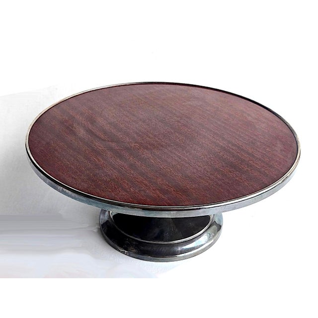 Offered is a chic and sleek mid 20th century pedestal cake platter made by Crescent Silverware Manufacturing Company. It...