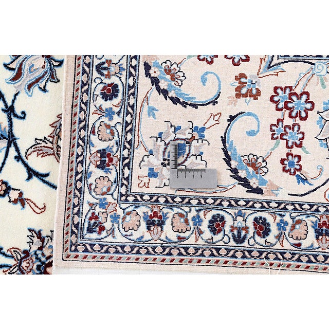 This nain rug is made of cotton and silk on cotton and is in a new and unused state. Very fine and dense link with approx....