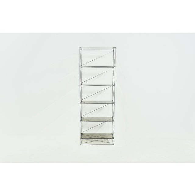 French minimalist design, this rare Isocele étagère by Max Sauze beautifully captures the sculptural clarity and...