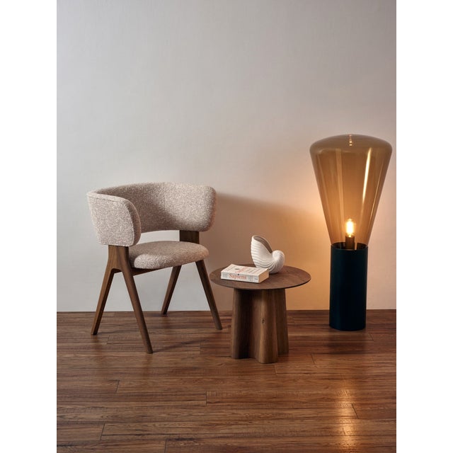 The Y Armchair pairs a solid European oak frame with a soft, upholstered seat – an elegant accent that works equally well...