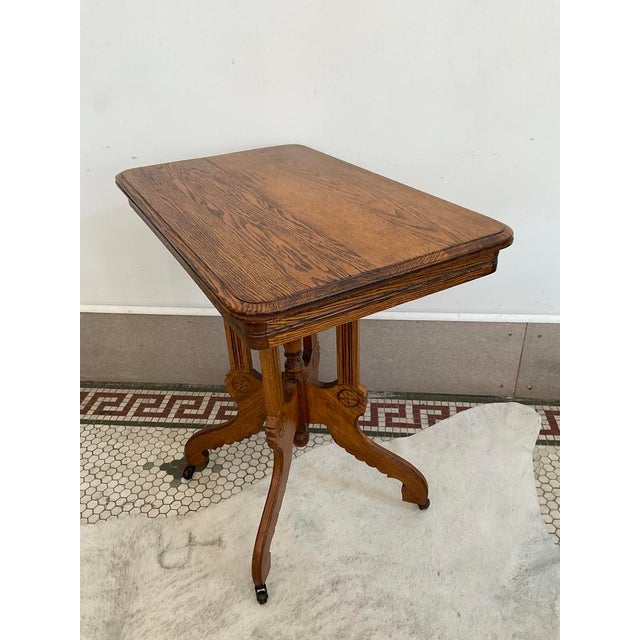 Antique Victorian Carved Quarter Sawn Oak Parlor Table on Casters, Eastlake Style For Sale - Image 4 of 18