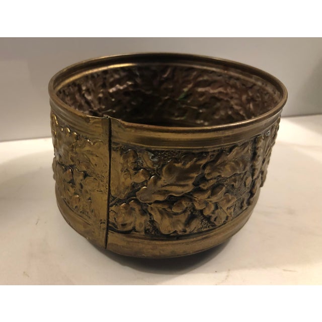 This footed English Oak Leaf Brass Planter is a one of a kind treasure for your home. The oak leaf design, the four ball...