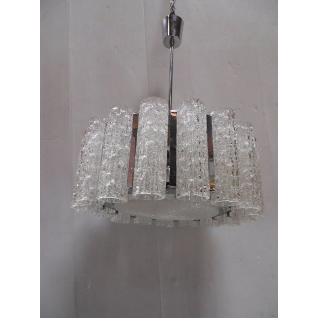 Marvelous Doria glass tubes and chrome chandelier, handblown in Murano, Italy. Diameter: 21" x Height 37" (with stem) 10"...