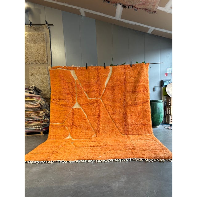 This exceptional Moroccan Beni Ouarain rug is a striking statement piece, handcrafted in the Atlas Mountains using...