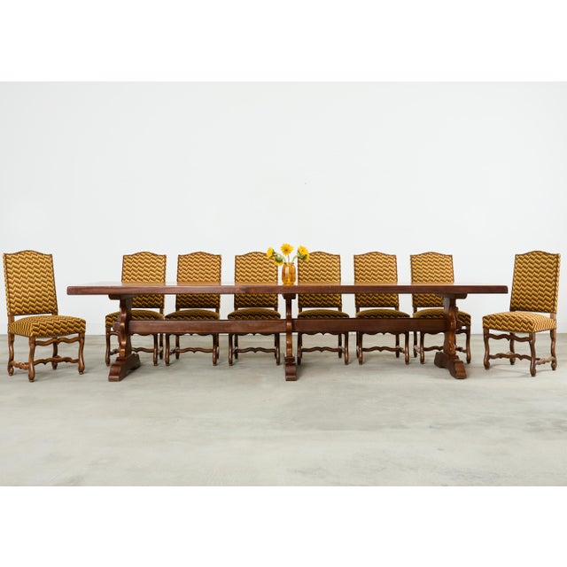 A refined set of eight restored/refurbished 20th Century French dining chairs crafted in the traditional Louis XIII...