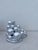 “Bubbles Candelabra 01 Silver ”, a single candle holder candelabra made of bubble shapes with different plastic textures...