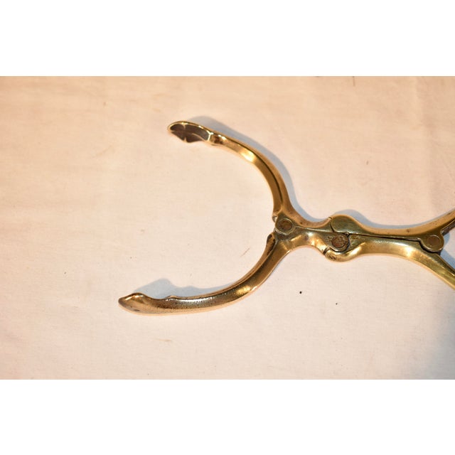 19th century pair of English brazier tongs, made from brass. These are truly wonderful, and are so unusual! Once used to...