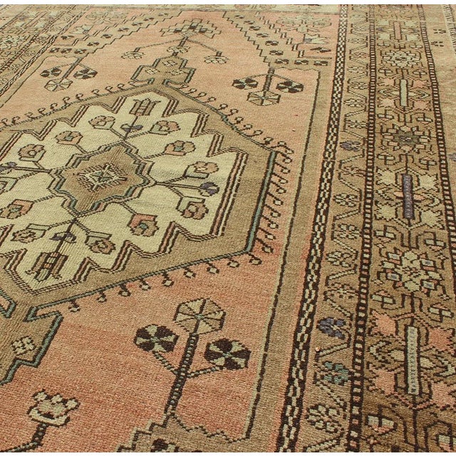 Mid 20th Century Vintage Turkish Oushak Rug in Soft Apricot, Ivory, and Brown With Medallions For Sale - Image 5 of 8