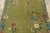Hand-knotted in wool, this 3x4 contemporary Chinese Deco accent rug presents a pistachio-green field enclosed by a soft...
