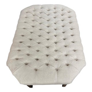 Custom Tufted Coffee Table With a Shelf Underneath and Fluted Wood Legs For Sale