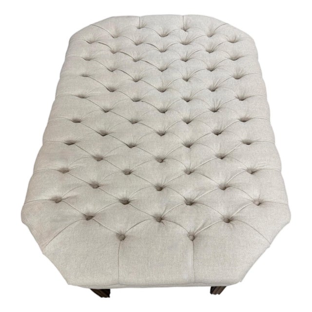 Custom Tufted Coffee Table With a Shelf Underneath and Fluted Wood Legs For Sale