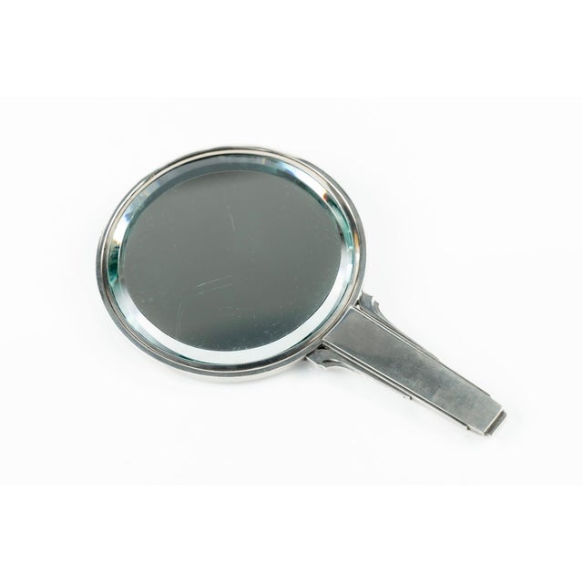 This elegant antique Danish Art Deco hand mirror, Model No. 224, was designed by Harald Nielsen for Georg Jensen and...