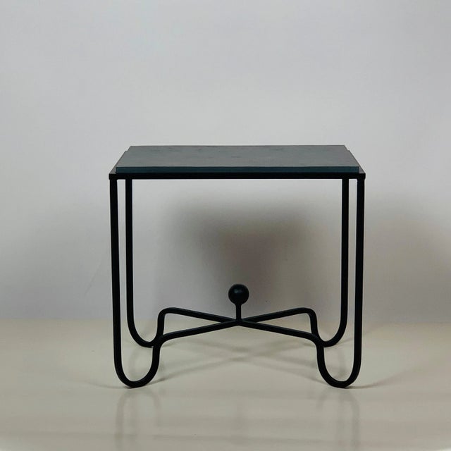 Chic grey slate 'Entretoise' side tables by Design Frères.