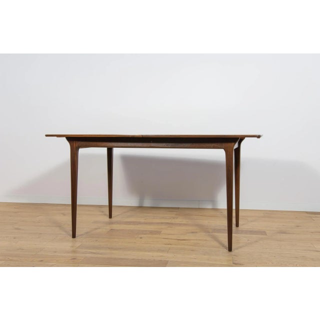 The table produced in the 1960s in Scotland by A.H. McIntosh. It is made from teak. The table has been cleaned from the...