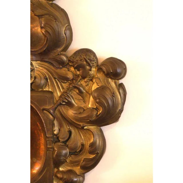 A wonderful and large two arm candle sconce done in the neoclassical style. Condition: Good, with rubbing and loss to...