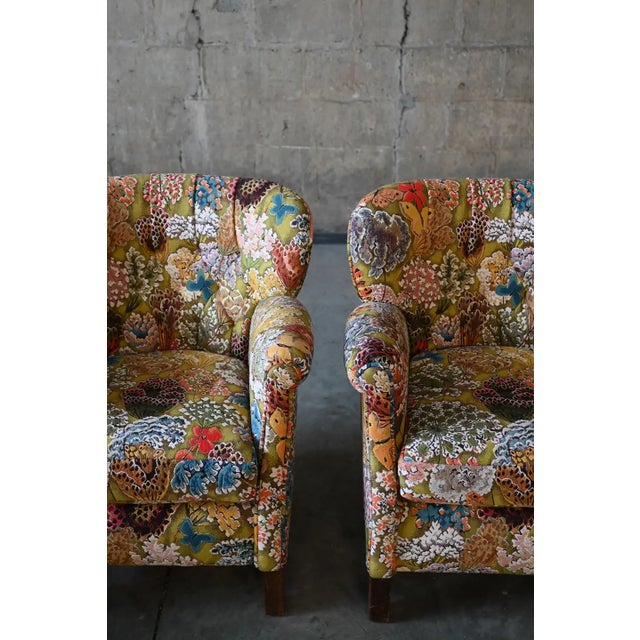 A pair of luscious fireside accent wing chairs. Diamond tufted rounded backs and rounded arms all newly upholstered in the...