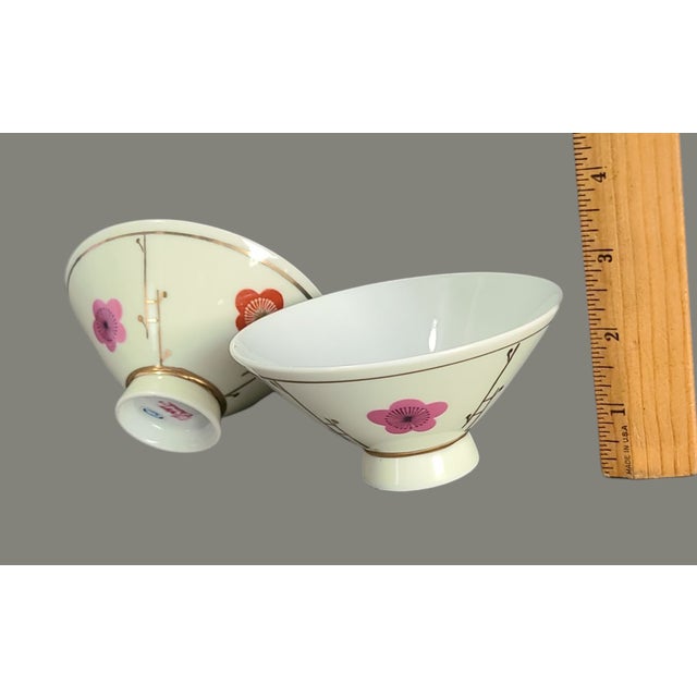 Discover the charm of mid-century design with this vintage pair of Asian Japanese Anjyo painted floral rice bowls. Each...