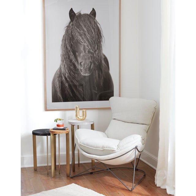 Andres natural hair on hide mixer tables are the perfect accent to any room. The metal frame gives a rustic feel while...