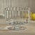 Ideal for decorating and displays, this optic glass bowl shelters your favorite treats with sophistication! A subtle...