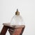 A vintage bell shaped glass prismatic pendant light shade which looks great both lit and unlit. The light has retained its...