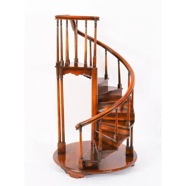 This is a superb quality fruitwood architectural model of a spiral staircase, by Theodore Alexander, of early 19th Century...