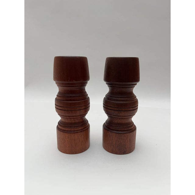 A vivid pair of turned in teak, Danish Modern candle holders. I love the symmetrical design of these. One of my favorite...